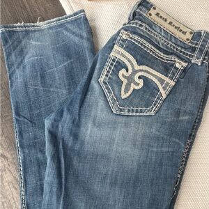Rock Revival Blue Boot Cut Jeans with Ornate Stitching